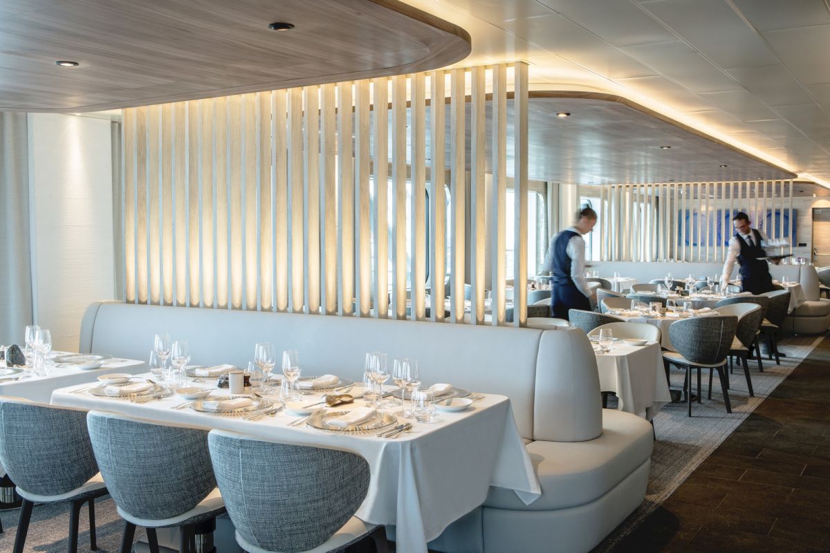 Gastronomic Restaurant Nuna (the earth) - Deck 5. On deck 5 you will find a 484 m? gourmet restaurant that can accommodate all of our passengers in a single service. Elegance and refinement will be at the rendezvous of your breakfasts lunches and dinners. The ship's second bridge is located at the back of the restaurant: behind its large windows you will have a front row seat to observe the crew during their operations. French and international cuisine. Fine wine cellar